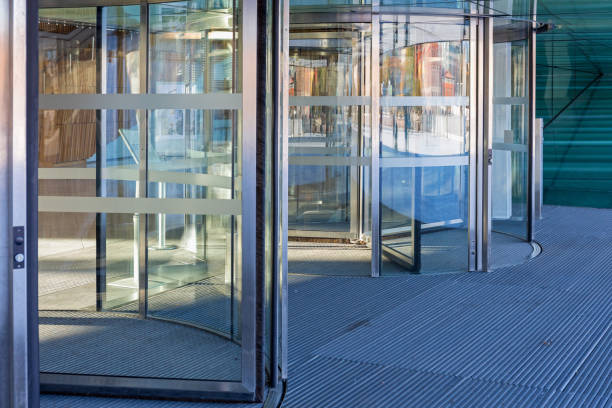 Automatic Revolving Doors at Modern Building Entrance