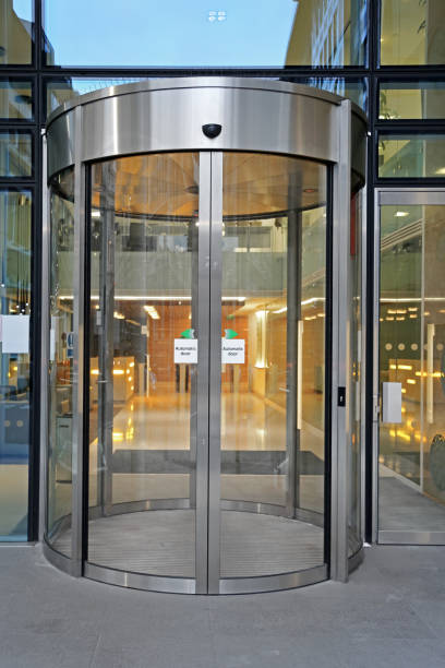 Automatic Revolving Door Entrance to Glass Office Building